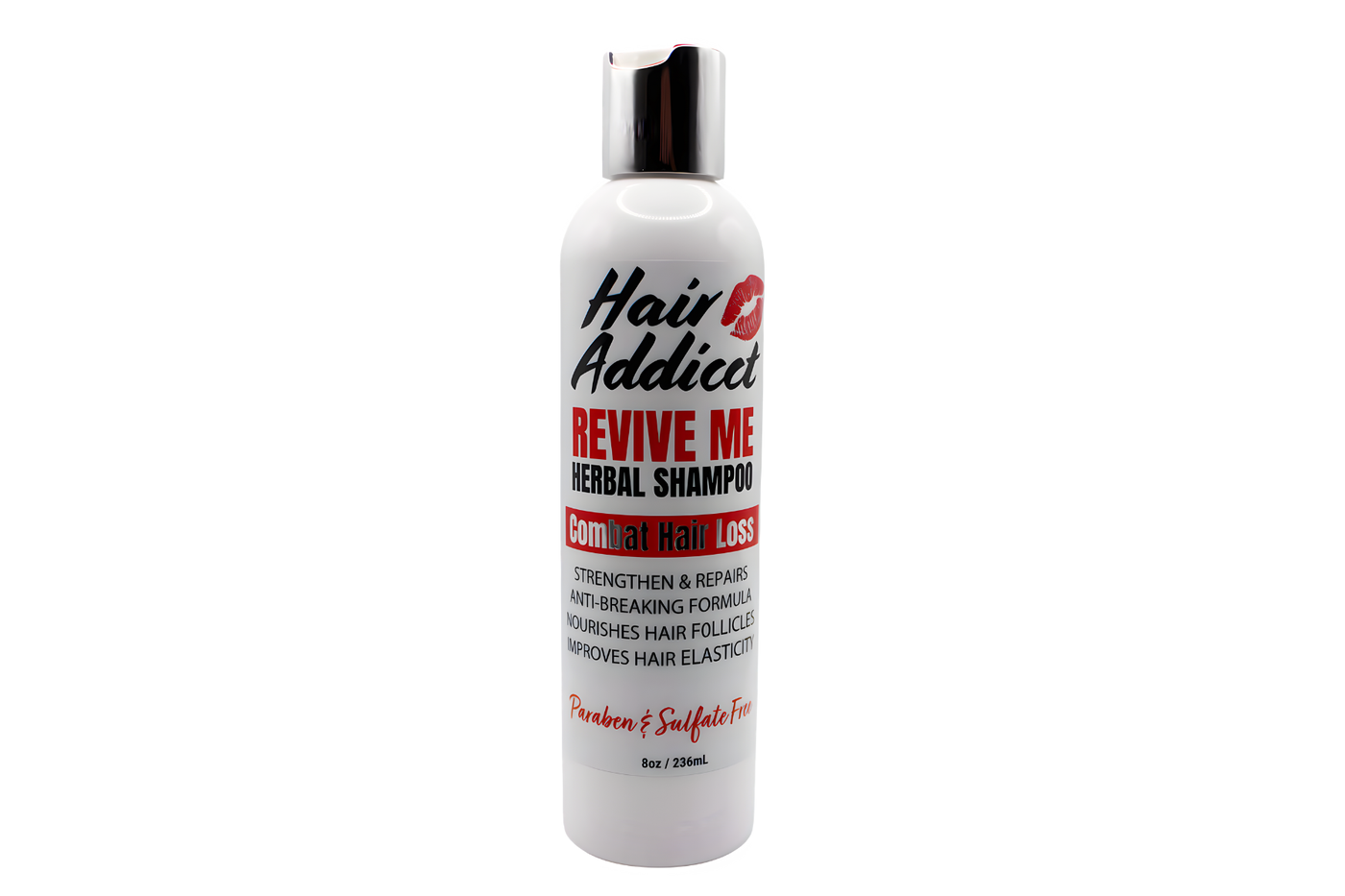 Hair Addict Revive Me Herbal Shampoo bottle on a white background.