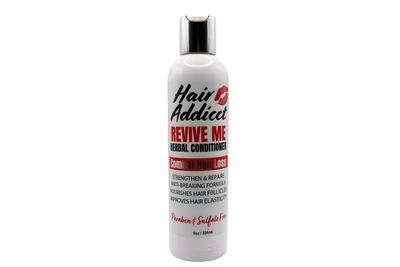 Hair Addict Revive Me Herbal Conditioner bottle on a white background.
