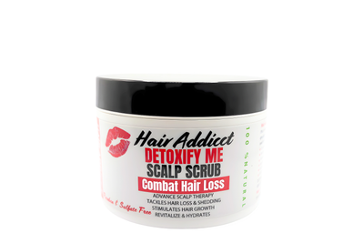 Hair Addicct Detoxify Me Scalp Scrub displayed on a white background, featuring its rich, restorative formula that seals moisture and strengthens hair.
